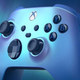 Image of a blue Xbox Series X/S controller against the backdrop of the Northern Lights.